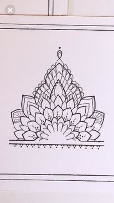 a black and white drawing of a lotus flower