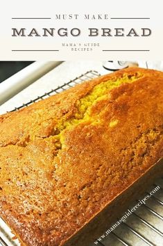 a loaf of mango bread sitting on top of a cooling rack with the words, must make mango bread