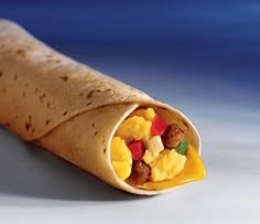 a tortilla wrap filled with fruit and vegetables