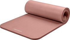 the yoga mat is rolled up and ready to be used as a mat for exercise