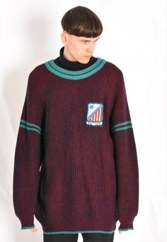 Vintage 80s Burgundy Knit Wool Blend Grunge Patch Jumper Mens Sweater Made in Italy Marked size: unmarked Estimated Size: L - XL Chest: 50.4 In (128 cm) Jumper length: 31.2 In (79 cm) Sleeve length: 25.6 In (65 cm) Shoulder to shoulder: 27.6 In (70 cm) Material: 70% acrylic 30% wool The model is 183cm (6ft) tall and usually wears size S/M clothes Be sure to contact us with any questions :) Follow us on Facebook (fb.com/magicxkale) or IG-magicxkale Vintage Knit Sweater With Ribbed Collar, Vintage Oversized Sweater With Ribbed Cuffs, Vintage College Sweater For Winter, Vintage Sweater For College In Winter, Vintage Winter Sweater For College, 90s Style Sweater For College In Winter, 90s Style Winter Sweater For College, 90s Style College Sweater For Winter, Vintage Crew Neck Sweater With Ribbed Collar