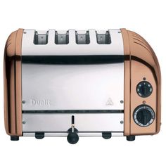 a toaster that is sitting on top of a white surface with four knobs