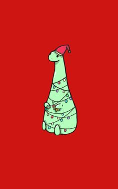 a green christmas tree sitting on top of a red background