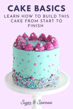 a blue cake with sprinkles on it and the words, learn how to build this cake from start to finish