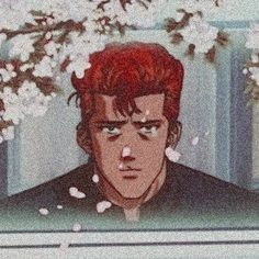 a man with red hair is looking out the window in front of cherry blossom trees