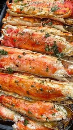 grilled lobsters with tomato sauce and parsley on the side, are ready to be cooked