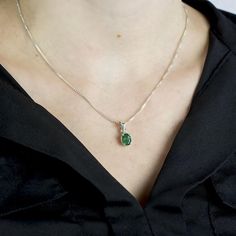 Emerald Pendant on Model Luxury Green Necklaces For Everyday Wear, Heart-shaped Emerald Necklace As A Gift, Emerald Heart Shaped Gemstone Necklace, Green Heart-shaped Emerald Necklace For Gift, Healing Emerald Pendant Necklace, Green Heart-cut Emerald Necklace, Emerald Necklace Pendant, Claw Necklace, Emerald Birthstone