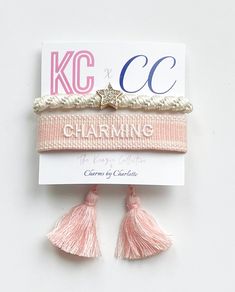 Embroidered tassel bracelet in soft pink and white from The Kenzie Collective paired with our winter white hair tie with a sparkly star charm $19.99 Winter White Hair, Kenzie Collective, Preppy Christmas List, Preppy Accessories, Preppy Christmas, Card Inspo, Star Hair, Tassel Bracelet, Beading Ideas