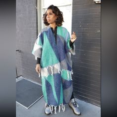 This Gorgeous, Fuzzy And Warm Sweater With Rope Tassel Details Is A Must Have. A Stylish Thick And Warm Layering Piece. A Fuzzy Texture With A Colorful Bold Print, Twisted Tassels, Open Front, Side Slits. Wear This Piece Over Any Bottoms For An Instant Upgrade. Size Inclusive (Fits Up To A Size 2x) And This Piece Is Most Definitely Tall Girl Friendly. One Size Fits Most. Measurements: 36-29-40 Height: 5'5 Length: 52in Shoulder Width: 32in Bust (Measured From Armpit To Armpit): 31in Sleeve Openin Open Front Poncho, Rope Tassel, Fuzzy Texture, Stay With Me, Warm Sweater, Tall Girl, Warm Sweaters, Bold Prints, Layering Pieces