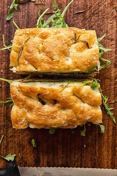 two slices of bread with herbs on top