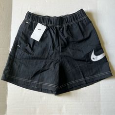 Womens Nike Loose Fit High Rise Shorts Black Nwt Size Small 100% Nylon.. Brand New With Tags Very Comfy Loose Fit Perfect For Everyday Wear. Two Front Pockets Zippered Rear Pocket And A Nice Big Nike Swoosh On The Left Leg. Take A Look At My Other Item And Bundle To Save On Shipping I Am Always Open To Reasonable Offers. Black Nylon Bottoms With Elastic Waistband, Nike Nylon Bottoms For Streetwear, Nike Nylon Bottoms With Elastic Waistband, Nike Casual Nylon Bottoms, Casual Nike Nylon Bottoms, Nike Casual Nylon Shorts, Casual Nike Nylon Shorts, Nike Nylon Summer Shorts, Nike Black Nylon Shorts