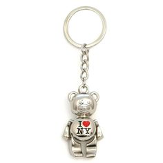 a key chain with a bear on it that says i love ny and is attached to the