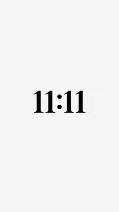 the word 11 11 is written in black on a white background