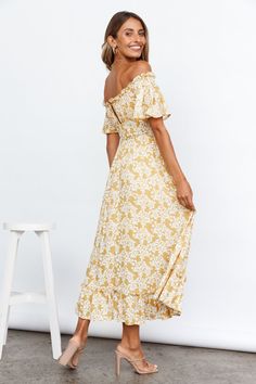 Length from shoulder to hem of size S: 109cm. Yellow print dress. Lined. Cold hand wash only. Model is a standard XS and is wearing size XS. True to size. Lightweight, non-stretchy woven fabric. Elasticated shoulder/ bust. Off-the-shoulder. Invisible back zipper and button clasp. Print placement may vary. Rayon. Sit under the trees and breathe in that fresh beautiful air, in the Boho Muse Midi Dress. An off the shoulder design, with a relaxed easy flowy dress that catches in the wind as you danc Yellow Flowy Dress, Midi Sundress, Yellow Midi Dress, Dress Yellow, Yellow Print, Yellow Fashion, Flowy Dress, Skirt Length, Woven Fabric