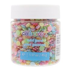 a jar filled with lots of colorful candy