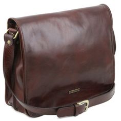 Italian fine craftsmanship creates a messenger bag with timeless, classic style. Made with Italian vegetable tanned, genuine full grain hand stained calfskin leather. Features two main compartments, front pocket, back zippered pocket, inside zippered pocket, credit card pockets, one open pocket, pen holder, back pockets with zip closures, adjustable leather shoulder strap, magnetic button closure, soft structure, and pigskin lining. Dust bag included. Dimensions: 14.57" L x 11.61" H x 4.33" D We Leather Briefcase Bag, Leather Messenger Bag Men, Brown Leather Shoulder Bag, Leather Laptop, Messenger Bag Men, Leather Messenger Bag, Leather Briefcase, Leather Messenger, Large Bag