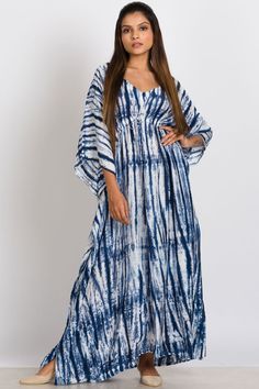 "Our Shibori Caftans are made with a luxurious 100% cupro material that is artistically hand tie dyed using the shibori tie dye technique. Women artisans in Western India do the shibori tie dye and the natural cupro material absorbs the colors beautifully. Cupro is a sustainable natural material that is made from the inner filaments of the cotton seed, so these garments have the look and feel of silk, but the breathability and easy care of cotton. These elegant free size caftans feature a drawst Jaipur Prints, Cotton Garments, Ladies Design, Style Africain, Shibori Dye, Tie Dye Techniques, Shibori Tie Dye, Woven Shoes, Hand Tie