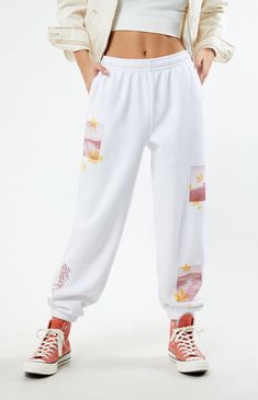 Sit back and relax all season long in the cute and comfy Pacific Sunwear Beach Sweatpants from PacSun. These high-waisted sweatpants feature an interior drawstring waistband for a customizable fit and Pacific Suwnear beach graphics. 


	Solid color sweatpants
	11.625" rise
	29.25" inseam
	High-rise
	Interior drawstring waistband
	Side hand pockets
	PacSun graphic
	Elastic ankle cuffs
	60% cotton, 40% polyester
	Machine washable
	Model is wearing a size small
	Model measurements: 5’7” height, 32.5” bust, 25.5” waist, 36” hip