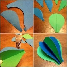 the steps to make an origami flower with green leaves and blue flowers on it