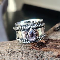 Welcome in SilverArtisanRingDescription Metal :- 925 Sterling SilverStyle :- Spinner Ring++++++++++++++++++++++++++++++++++++++++++++Benefit of Amethyst Stone:- =  Amethyst helps in improving communication and self expression of people. ...=    Purple is a very calming color and is also the color for throat chakra so people wear it around neck. =   It helps in providing inner peace, mental stability and balances the Thyroid gland.++++++++++++++++++++++++++++++++++++++++++++Occasion : Birthday Ev Wide Band Stackable Promise Rings, Stackable Wide Band Promise Ring, Stackable Wide Band Rings For Anniversary, Stackable Anniversary Rings With Wide Band, Anniversary Stackable Rings With Wide Band, Sterling Silver Stackable Rings For Promise, Amethyst Promise Ring With Stone Setting, Sterling Silver Wide Band Stackable Rings For Promise, Stackable Amethyst Jewelry For Anniversary