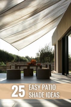 an outdoor patio area with chairs and tables under a white shade covering over the patio