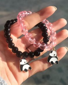 Handmade glass bead bracelet set Features cute panda charm Includes black and pink beaded bracelets Durable elastic string for easy wear Perfect for friendship or birthday gifts Lightweight and comfortable Ideal for everyday wear Adds a playful touch to any outfit Makes a thoughtful gift for panda lovers Suitable for all wrist sizes Cheap Black Bracelets For Birthday Gift, Affordable Fun Bracelets As A Gift, Cheap Round Beaded Bracelets For Best Friend, Cheap Flexible Bracelets As Gift, Cheap Kawaii Bracelets For Birthday, Cute Cheap Bracelets For Best Friend Gift, Cheap Pink Bracelets For Best Friend Gift, Cheap Novelty Bracelets For Best Friend Gift, Trendy Cheap Beads For Friendship