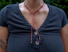 This item is one-of-a-kind and hand-crafted using glass beads and charms. Wear this as a bolo tie or tie it into a bow! The versatile piece is sure to add variety to your jewelry collection. Diy Bolo Ties, Beaded Bolo Ties, Sea Beads, Bolo Tie Necklace, Tie Necklace, Bolo Ties, Craft Day, Bolo Tie, Jewelry Ideas