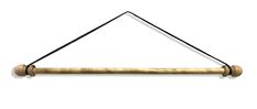 an old fashioned brass hanging object with black cord and wooden handles on a white background