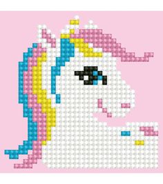 a cross stitch pattern of a pink and white unicorn with blue, yellow, and pink hair