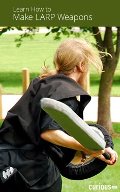 a woman holding a frisbee in her right hand