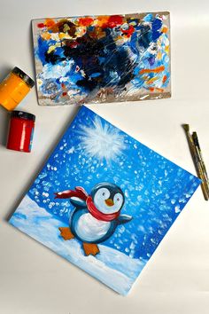 A Christmas-themed canvas painting of a happy penguin wearing a red scarf, standing in a snowy winter scene. Penguin Painting, Easy Painting Projects, Penguin Art