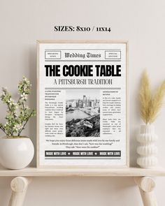 an old newspaper advertises the cookie table, which is located on a shelf next to a potted plant