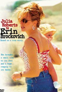 a woman holding a baby in her arms with the caption julia roberts on it