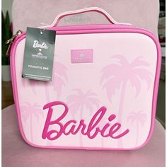 Experience The Unique Blend Of Organization And Style With Our Exclusive Special Edition Barbie Cosmetic Bag. This Bag Features A Malibu Barbie Print With Its Puff-Embossed Barbie Logo And Palm Trees Adorning The Front. When You Unzip The Bag, You'll Be Greeted By The Iconic Barbie Silhouette And Palm Trees, Transforming The Spacious Interior Into A Miniature Paradise. Designed For Ultimate Convenience, It Comes With Removable Dividers, A Handy Mesh Pocket, A Vinyl-Lined Brush Holder Flap, And A Barbie Print, Barbie Silhouette, Barbie Logo, Impressions Vanity, Pink Cosmetics, Lavender Nails, Makeup Travel Case, Malibu Barbie, Pink Girly Things