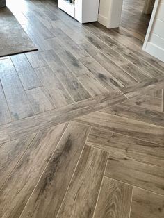 Herringbone Flooring Wood Floor Layout Pattern, Herringbone Wood Look Tile Floor, Lvp Flooring Patterns, Angled Flooring, Herringbone Lvp Flooring, Tile Transition To Tile, Wood Porcelain Tile Floor, Different Flooring In Different Rooms, Tile Patterns Floor Layout