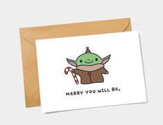 a christmas card with an image of a baby yoda holding candy canes and the words merry you will be