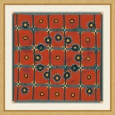 an orange and black square with flowers on it in a gold framed art print frame