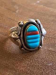 Navajo Turquoise Coral Sterling Silver Mens Ring Size 10.75. It measures 5/8 of an inch long 7/8 of an inch wide. Signed by artist and stamped sterling silver. Thank you for checking out my store, if you have any questions please contact me!! SKU:32461969293397_7d21859* Vintage Blue Concho Ring, Southwestern Polished Turquoise Ring Collectible, Southwestern Stamped Turquoise Ring, Western Style Blue Turquoise Ring With Inlay, Silver Mens Ring, Signature Rings, Mens Ring Sizes, Sterling Silver Mens Rings, Native American Turquoise