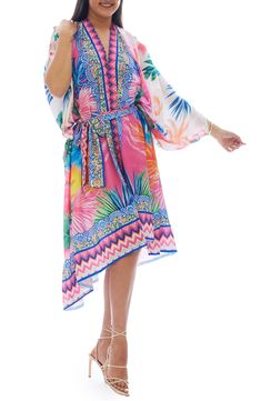 Strut your stuff down to the pool in this lightweight ruana with a bold pattern for eye-catching appeal. Ties at front V-neck
 Long sleeves 100% polyester Hand wash, dry flat Imported Model stats: 5'10" height, 32" bust, 25" waist, 36" hip. Multicolor Printed Cover-up With Kimono Sleeves, Multicolor Hawaiian Cover-up With Tropical Print, Tropical Multicolor Kimono Sleeves Cover-up, Multicolor V-neck Cover-up For Pool, Pink Vibrant Print Kaftan For Vacation, Casual Pink Printed Cover-up, Multicolor V-neck Pool Cover-up, Multicolor Tropical Print Kaftan For Vacation, Tropical Printed Vacation Kaftan