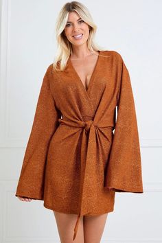 Bell sleeves tie waist V neck knit mini wrap dress.95/5 Polyester/ Spandex Mini Wrap, Mini Wrap Dress, Polyester Spandex, Bell Sleeves, Camel, Wrap Dress, Spandex, V Neck, Knitting