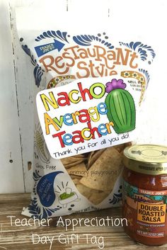 a bag of nacho average teacher chips next to a jar of peanut butter