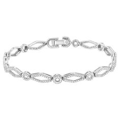 Dress her wrist in luxury with this enticing vintage-inspired diamond bracelet. Crafted in cool weaves of .925 sterling silver, this shimmering design features alternating circle and kite-shaped links that sparkle with diamonds and are lined with intricate milgrain detail. Captivating with 1-1/2 cts. t.w. of diamonds and a brilliant buffed luster, this 7.0-inch bracelet secures with a tongue and groove clasp. Product features: Diamond Type: Natural White Diamonds Diamond Count: 338 Round-Cut Dia Diamond Settings, Bracelet Clasps, 2 Carat, White Diamonds, Diamond Clarity, Round Cut Diamond, Vintage Stil, Sterling Silver Bracelets, Link Bracelets