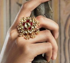 *It's One of a kind Antique Statement Kundan Wedding Ring. *It's made from Silver and Copper with Multi Color Kundan Stones Settings & 22k gold Plating as shown in picture. *It's beautiful Ethnic 1.4 Inch Round Unique Bridal Ring. *It's Adjustable and fit for all size. *Our all jewelry is made from semiprecious stones and beads. *WARRANTY: ITS GENUINE HANDMADE JEWELRY AND WE ARE GIVING LONG LIFE WARRANTY FOR OUR ALL ITEMS. All of our Kundan Jewelry is 100% handmade with ancient Kundan stone Indian Wedding Rings, Indian Rings, Kundan Jewelry, Jewellery Wedding, Heritage Jewellery, Antique Jewelry Indian, Jewellery Sketches, Gold Rings Fashion, Bollywood Jewelry