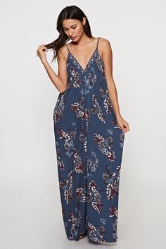 Are You Summer Ready? A beautiful and versatile sleeveless maxi dress in a floral print. Featuring adjustable spaghetti straps, an oversize cocoon fit, an embroidered trim v neckline, and side pockets. Great Resort Wear! Stay Sexy! Fabric: 100% Rayon Floral Embroidered Sundress Maxi Dress For Vacation, Floral Embroidery Maxi Dress For Vacation, Floral Embroidered Maxi Dress For Vacation, Casual Floral Embroidered Maxi Dress For Beach, Summer V-neck Unlined Maxi Dress, Flowy Maxi Dress With Floral Embroidery For Vacation, Flowy Floral Embroidered Maxi Dress For Vacation, Floral Embroidered V-neck Maxi Dress For Brunch, Casual V-neck Unlined Maxi Dress