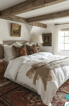 a large bed sitting in a bedroom on top of a rug