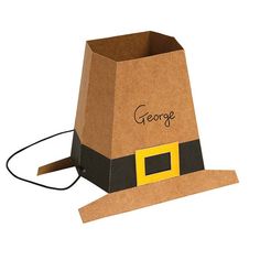 a brown paper bag with the word george on it and a yellow square in the middle