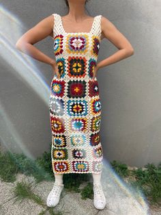 * Bhava Style Crochet Granny Square Colorful Dress * Ready to ship * %100 Cotton * The model is wearing a small 50 kg, 1.65 length * %100 Cotton yarns * Completely Hand-knitted  * It is recommended to wash at 30 degrees or just hand wash with cold water. * After we ship your product, we give you a tag number. This number is updated within the first 24 hours. Then you can follow the updates by clicking on them. Welcome to Bhava's 🌻 Here you will find tops, skirts, shirts, dresses, cardigans, and Multicolor Square Neck Maxi Dress For Beach, Fitted Crochet Maxi Dress, Retro Fitted Crochet Dress For Beach, Fitted Maxi Length Crochet Dress, Spring Multicolor Crochet Lace Dresses, Bohemian Dresses With Granny Square Details, Fitted Retro Crochet Dress For The Beach, Bohemian Granny Square Dresses, Beach Midi Dress With Crochet Details