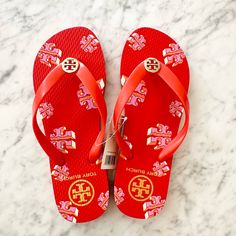 Tory Burch Women’s Printed Crazy Logo Poppy Red Flip Flop Size 7 Brand New With Tag! Lightweight And Ultra-Comfortable With A Mini Logo Medallion For A Touch Of Polish. It's The Perfect Extra Pair To Throw In Your Bag, Whether You're Heading To The Gym Or A Warm-Weather Getaway! Size 7 Color: Poppy Red Signature Logo Printed Gold-Tone Hardware No Box Fast Shipping Smoke Free House Trendy Red Flat Flip Flops, Red Flip Flops For Spring Vacation, Red Flat Flip Flops For Spring, Red Flip Flops, Mini Logo, Mini Logos, Poppy Red, Red Poppies, Tory Burch Shoes