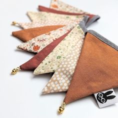 several small triangle shaped pieces of fabric