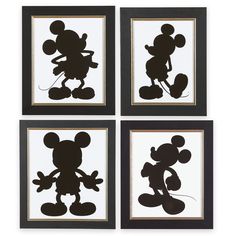 four framed mickey mouse silhouettes in black and white